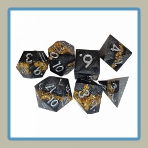 sharp edge rpg dice set in charcoal and gold colors